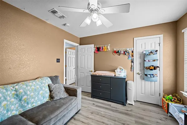 a living room with furniture and a couch