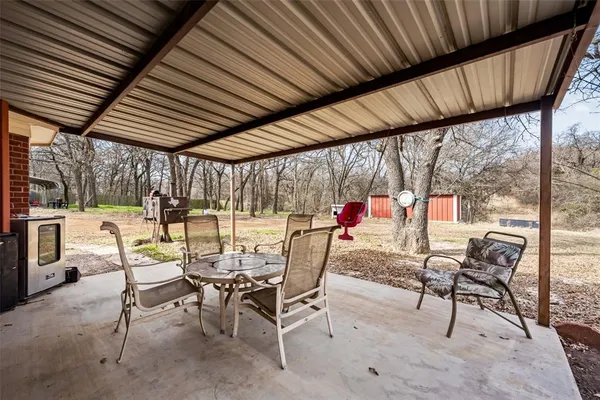 a view of an outdoor space with seating area