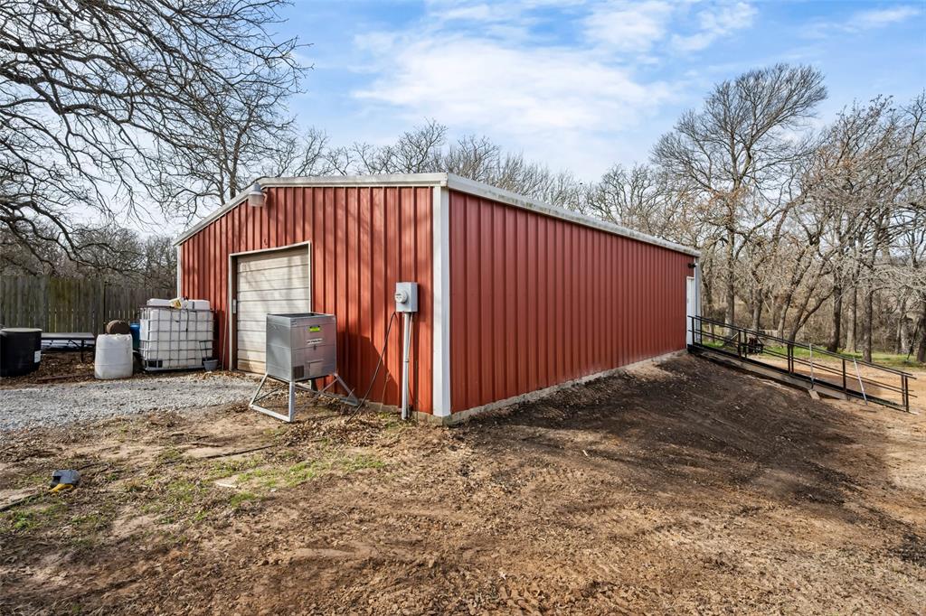 7698 Farm To Market 920 Poolville, TX 76487 - Photo 28 of 37 a view of backyard of house