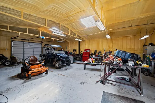 a view of a garage with parked cars