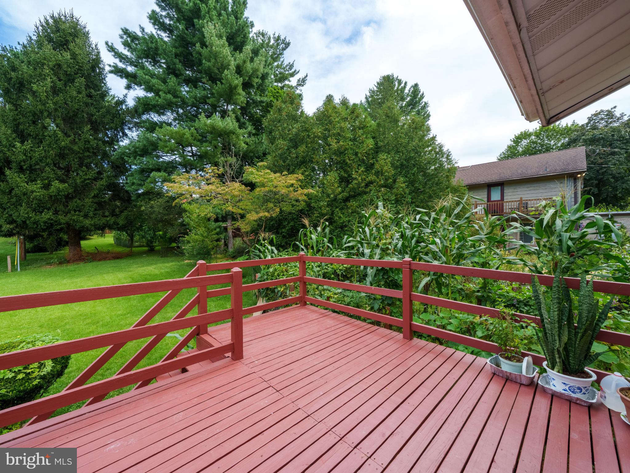 105 School House Road Lancaster, PA 17603 - Photo 22 of 33 Serene deck overlooking lush greenery.