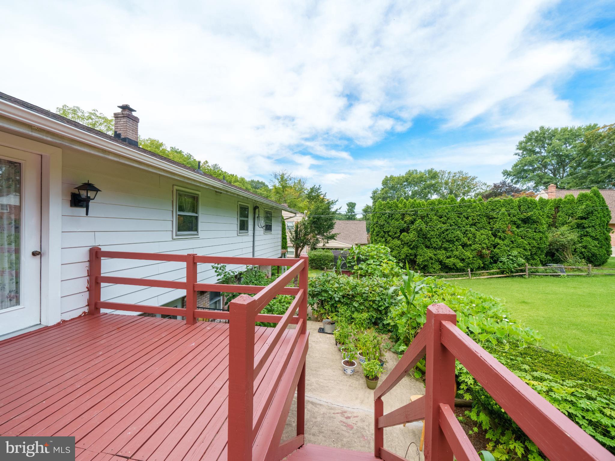 105 School House Road Lancaster, PA 17603 - Photo 23 of 33 Charming deck overlooking lush greenery.