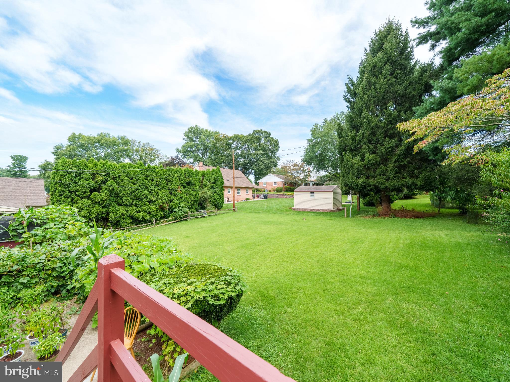 105 School House Road Lancaster, PA 17603 - Photo 24 of 33 Lush green yard with serene landscape views.