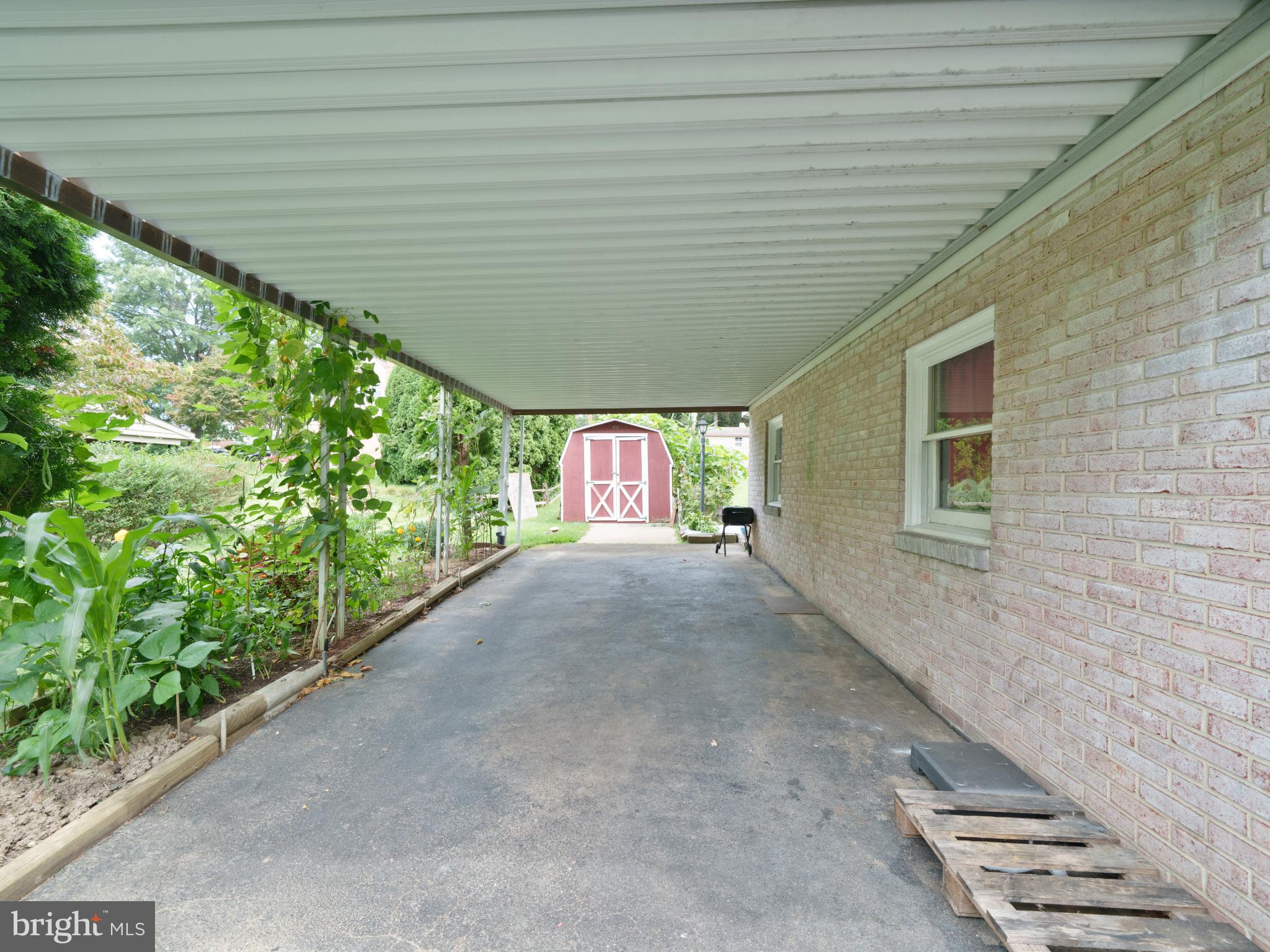 105 School House Road Lancaster, PA 17603 - Photo 25 of 33 Charming carport with garden views.