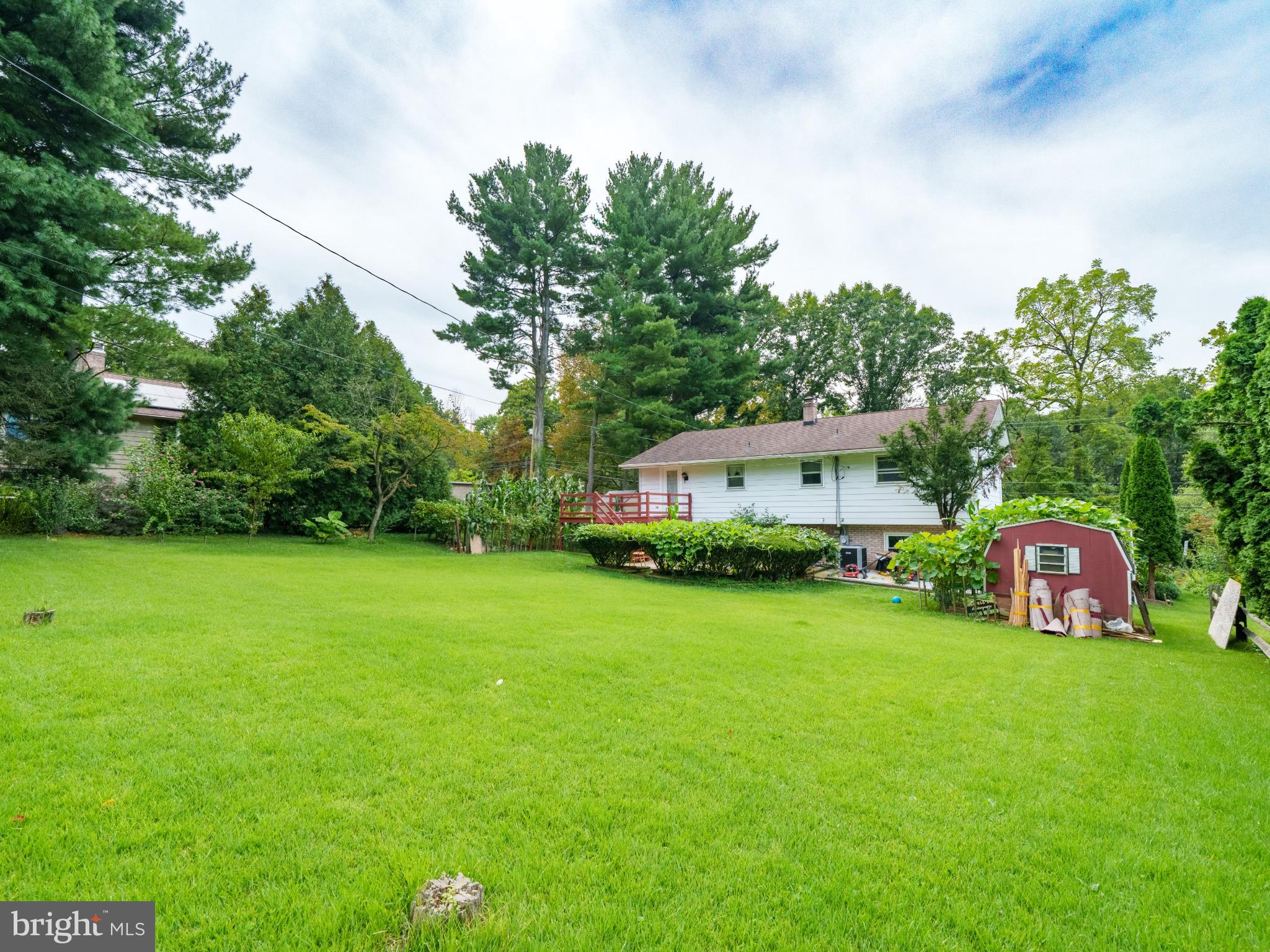 105 School House Road Lancaster, PA 17603 - Photo 29 of 33 Spacious backyard oasis with lush greenery.