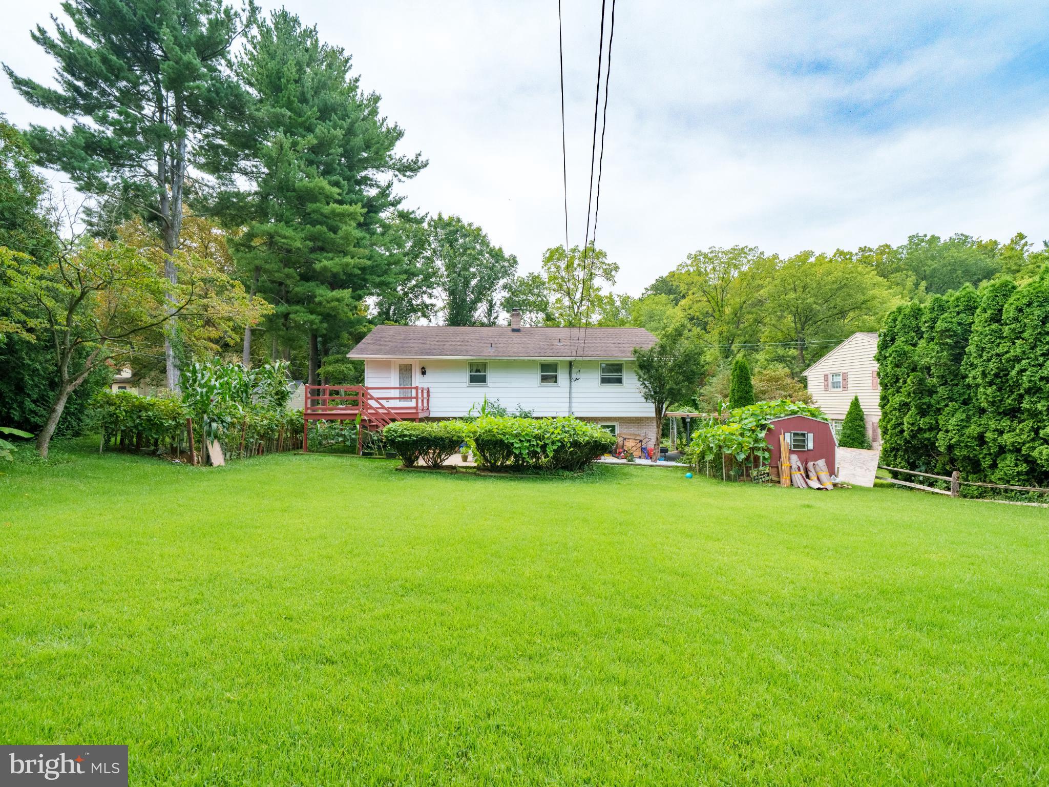 105 School House Road Lancaster, PA 17603 - Photo 30 of 33 Spacious backyard oasis with lush greenery.