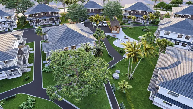 an aerial view of multiple houses with yard