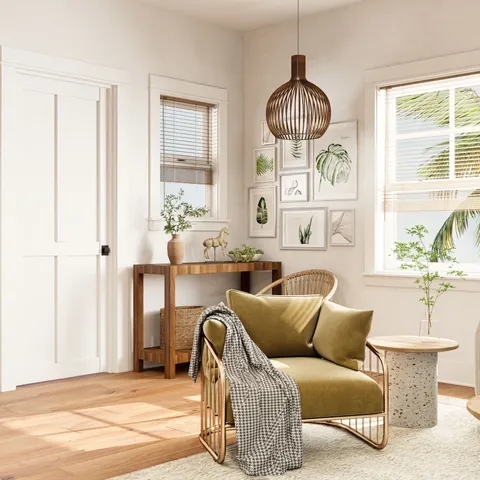 a living room with furniture a window and a chandelier