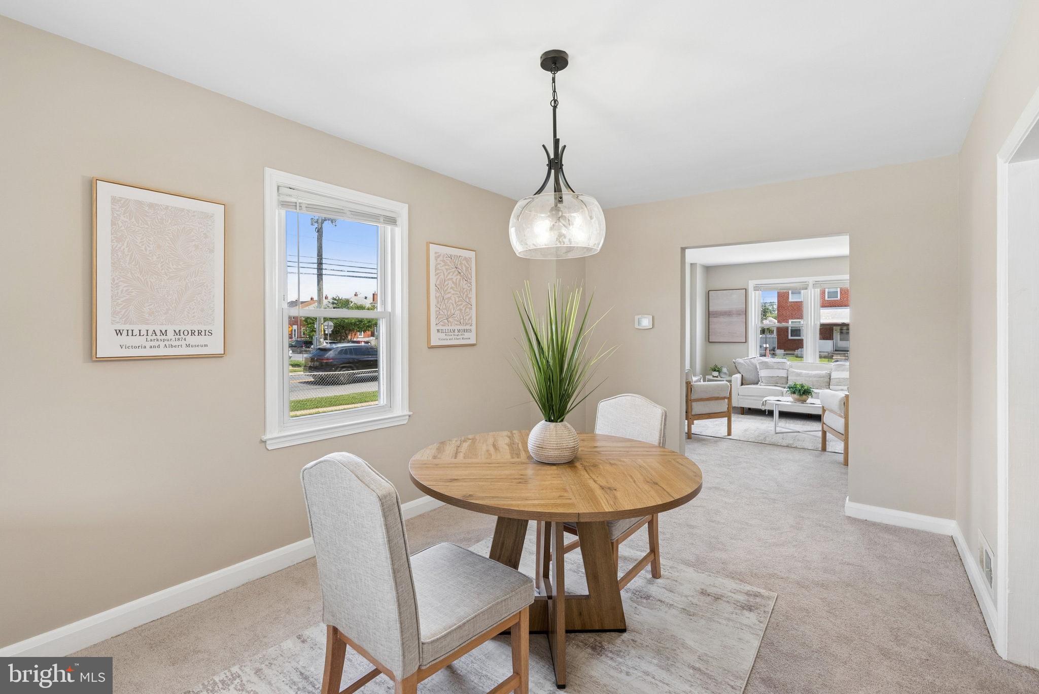 2169 Firethorn Road Baltimore, MD 21220 - Photo 26 of 53 Bright dining space with modern charm.