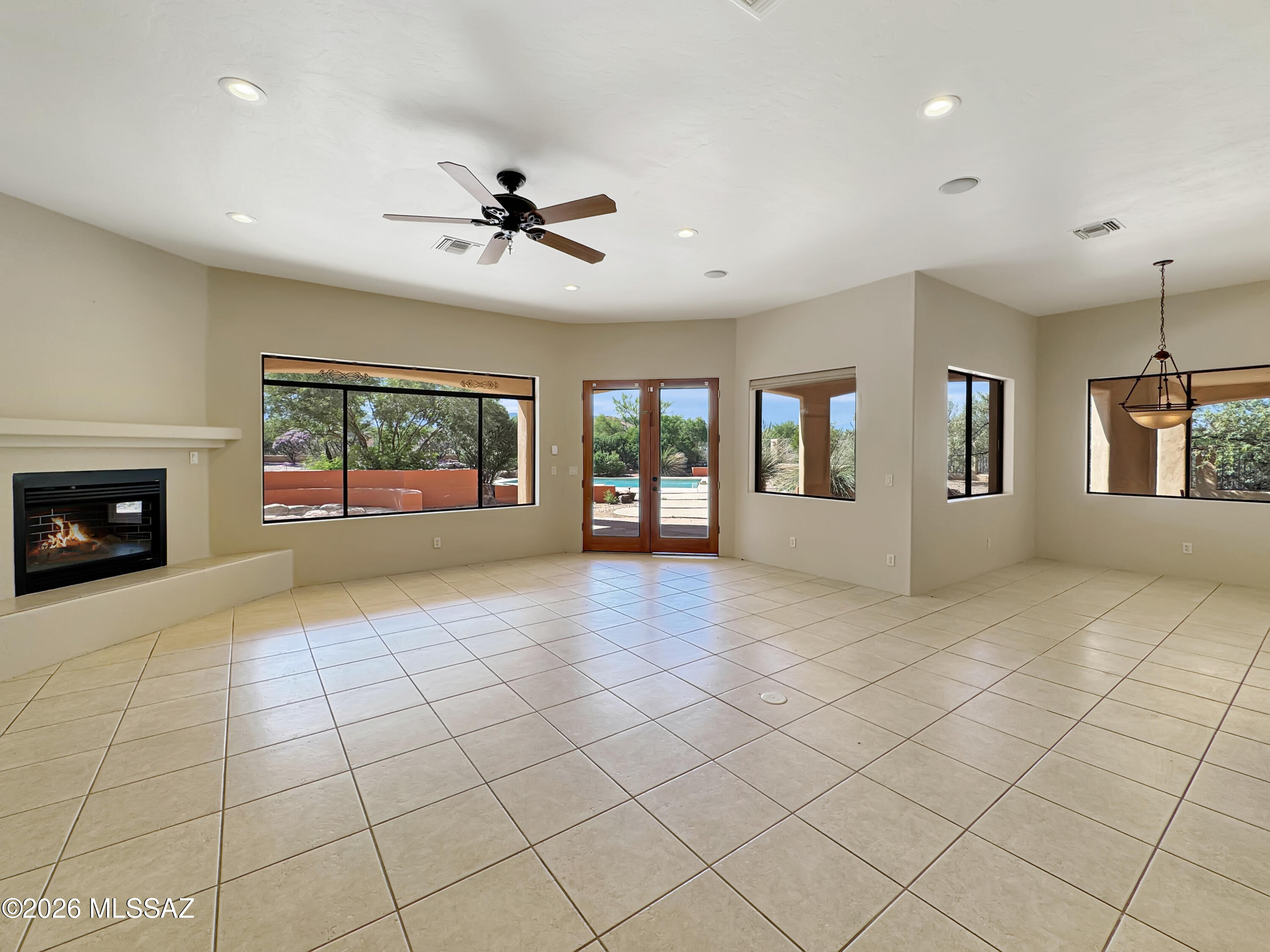 16781 Sycamore Ridge Trail Vail, AZ 85641 - Photo 8 of 50 Flexible living space with fireplace and great room