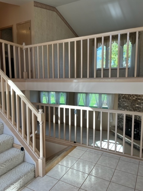 915 Harmoni Lane New Lenox, IL 60451 - Photo 17 of 38 a view of wooden balcony
