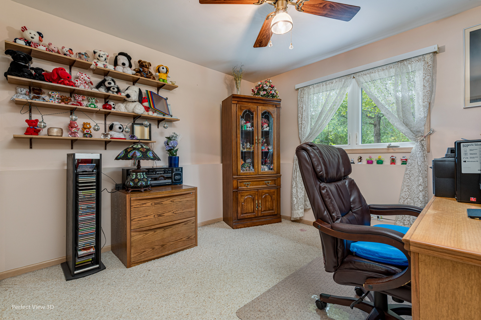915 Harmoni Lane New Lenox, IL 60451 - Photo 34 of 38 a view of a workspace with furniture and a window
