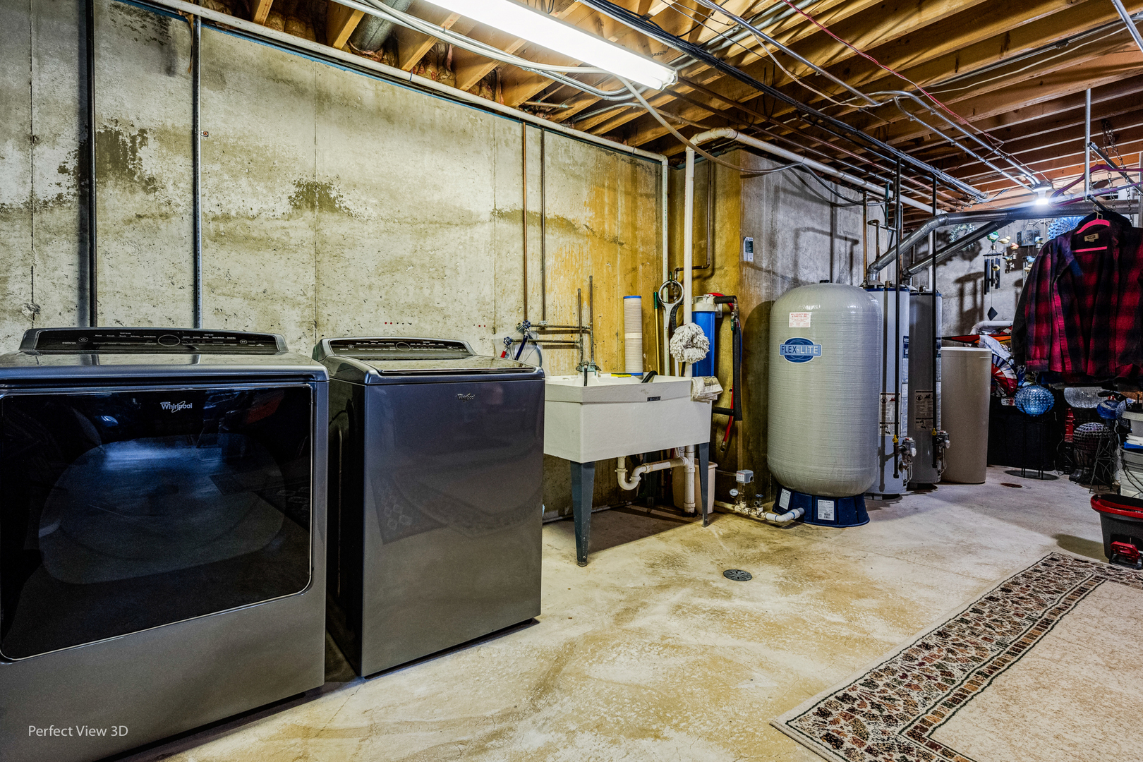 915 Harmoni Lane New Lenox, IL 60451 - Photo 37 of 38 a room with water heater and wooden cabinets