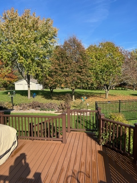 915 Harmoni Lane New Lenox, IL 60451 - Photo 9 of 38 a view of a balcony with wooden floor and lake view