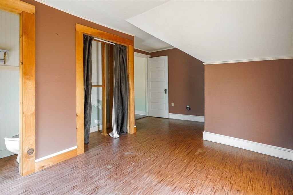 1255 Old Plainville Road New Bedford, MA 02745 - Photo 23 of 23 an empty room with wooden floor and a window