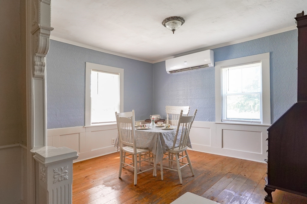 1255 Old Plainville Road New Bedford, MA 02745 - Photo 4 of 23 a view of a dining room with furniture and wooden floor