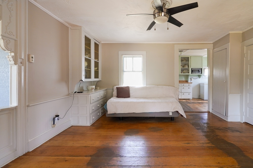 1255 Old Plainville Road New Bedford, MA 02745 - Photo 9 of 23 a spacious bedroom with a bed and window