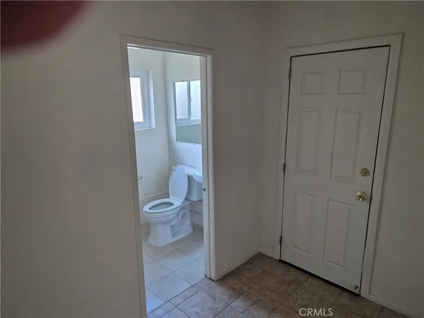 a bathroom with a toilet