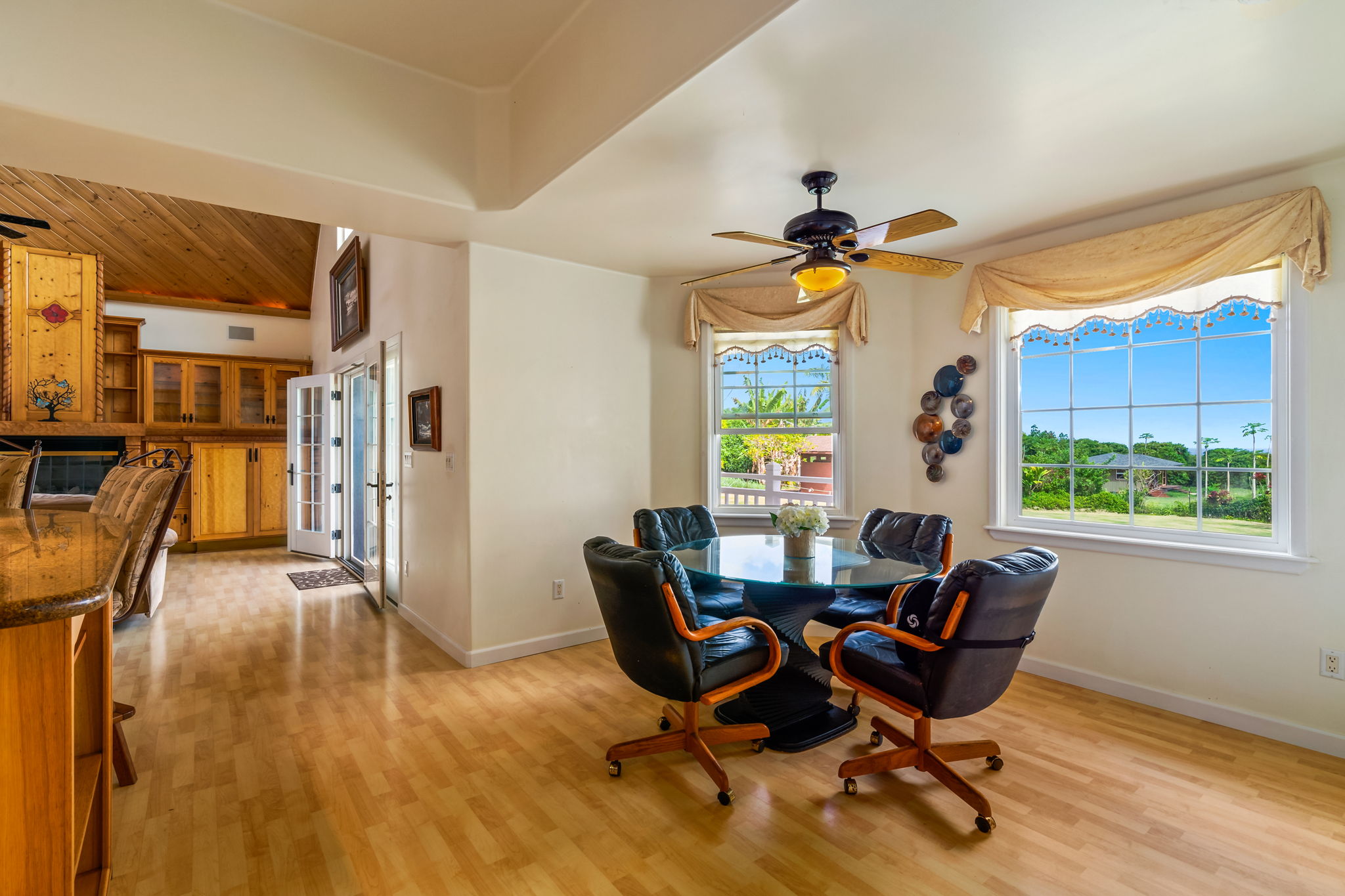 6201 B Kawaihau Road, Unit B Kapaa, HI 96746 - Photo 11 of 30 a dining room with furniture and window