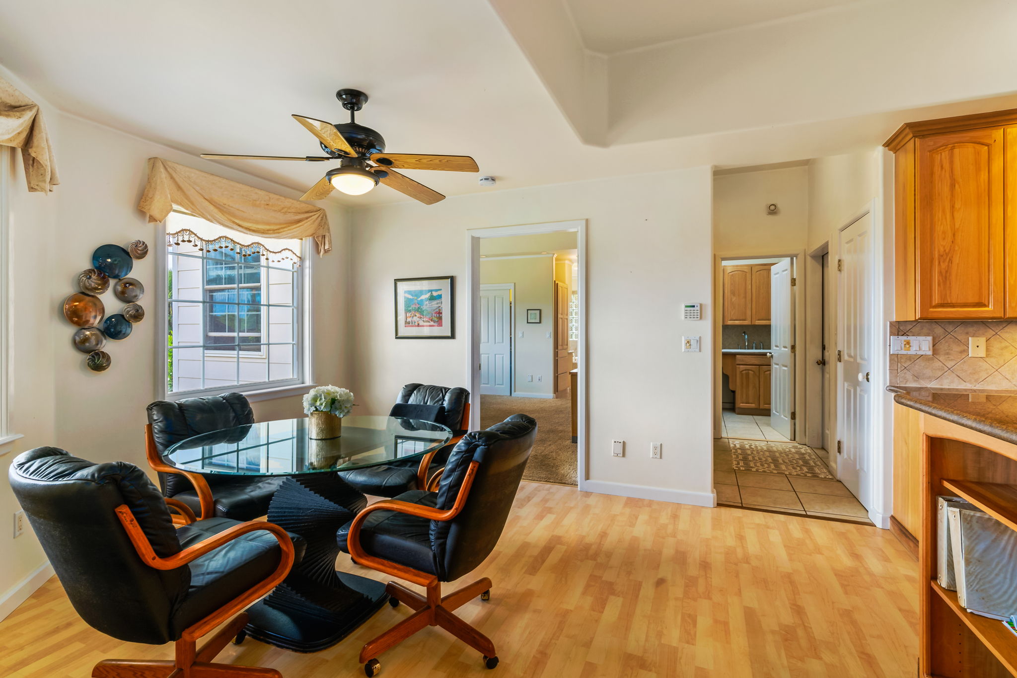 6201 B Kawaihau Road, Unit B Kapaa, HI 96746 - Photo 12 of 30 a dining room with furniture and window