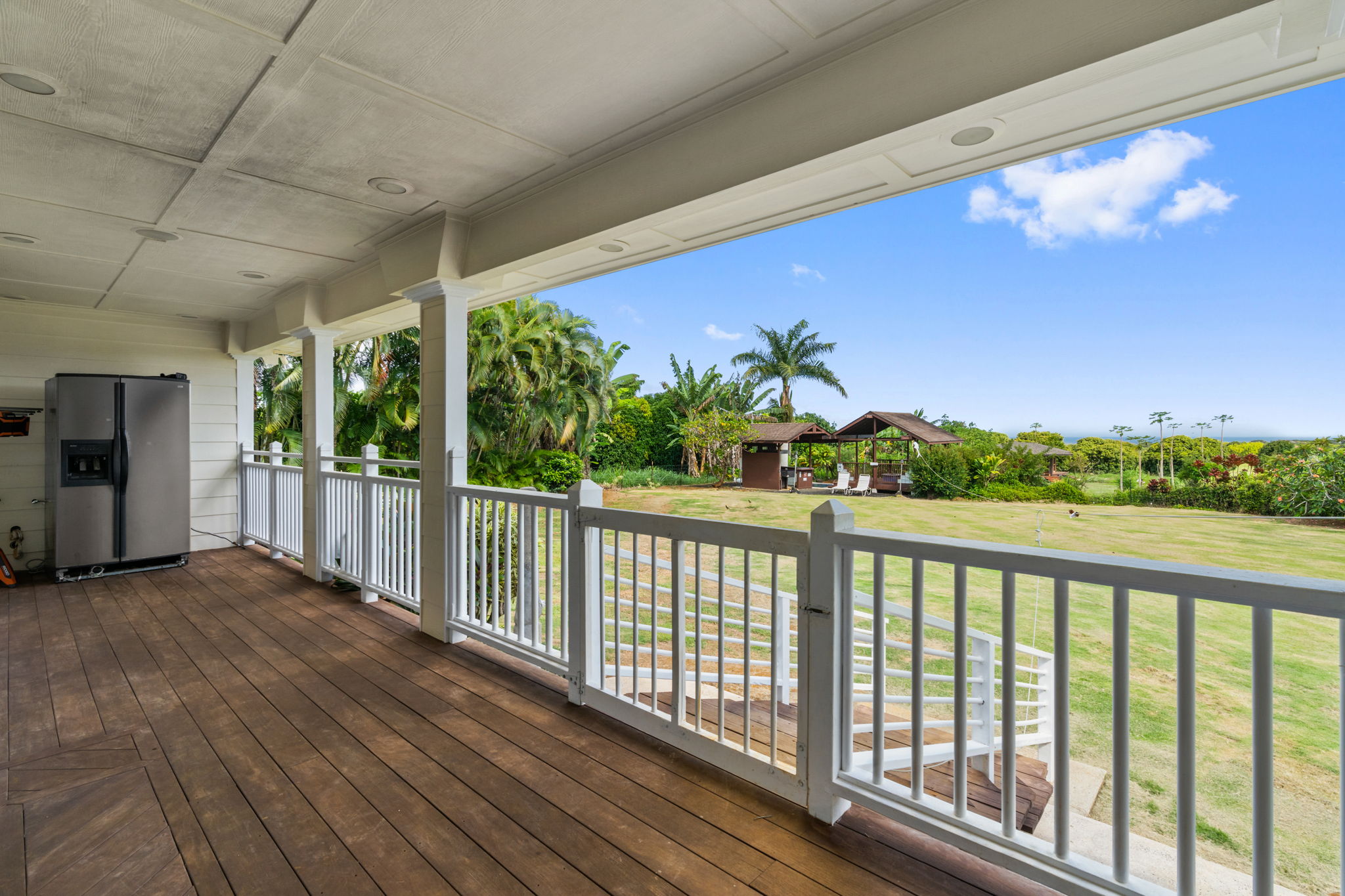 6201 B Kawaihau Road, Unit B Kapaa, HI 96746 - Photo 13 of 30 a view of balcony with wooden floor