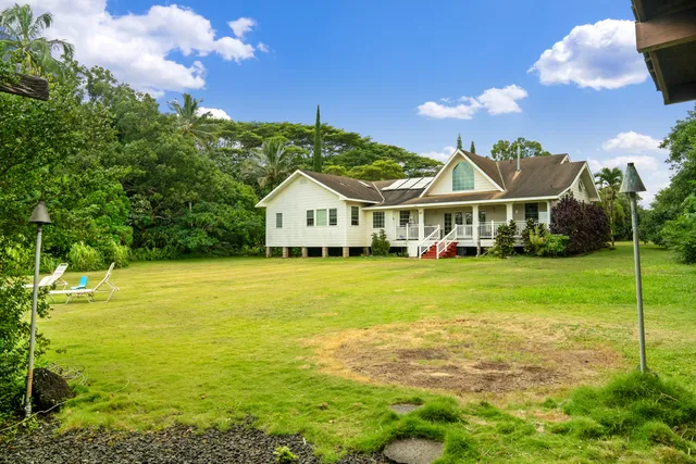 a view of a house with a big yard