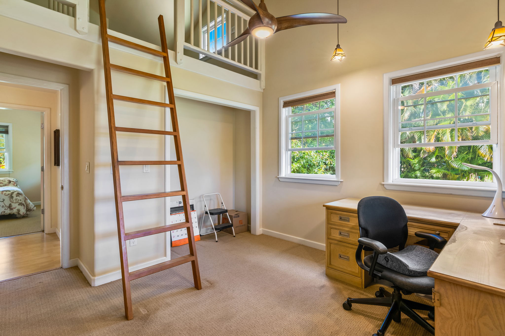 6201 B Kawaihau Road, Unit B Kapaa, HI 96746 - Photo 25 of 30 a workspace with hardwood table and a window