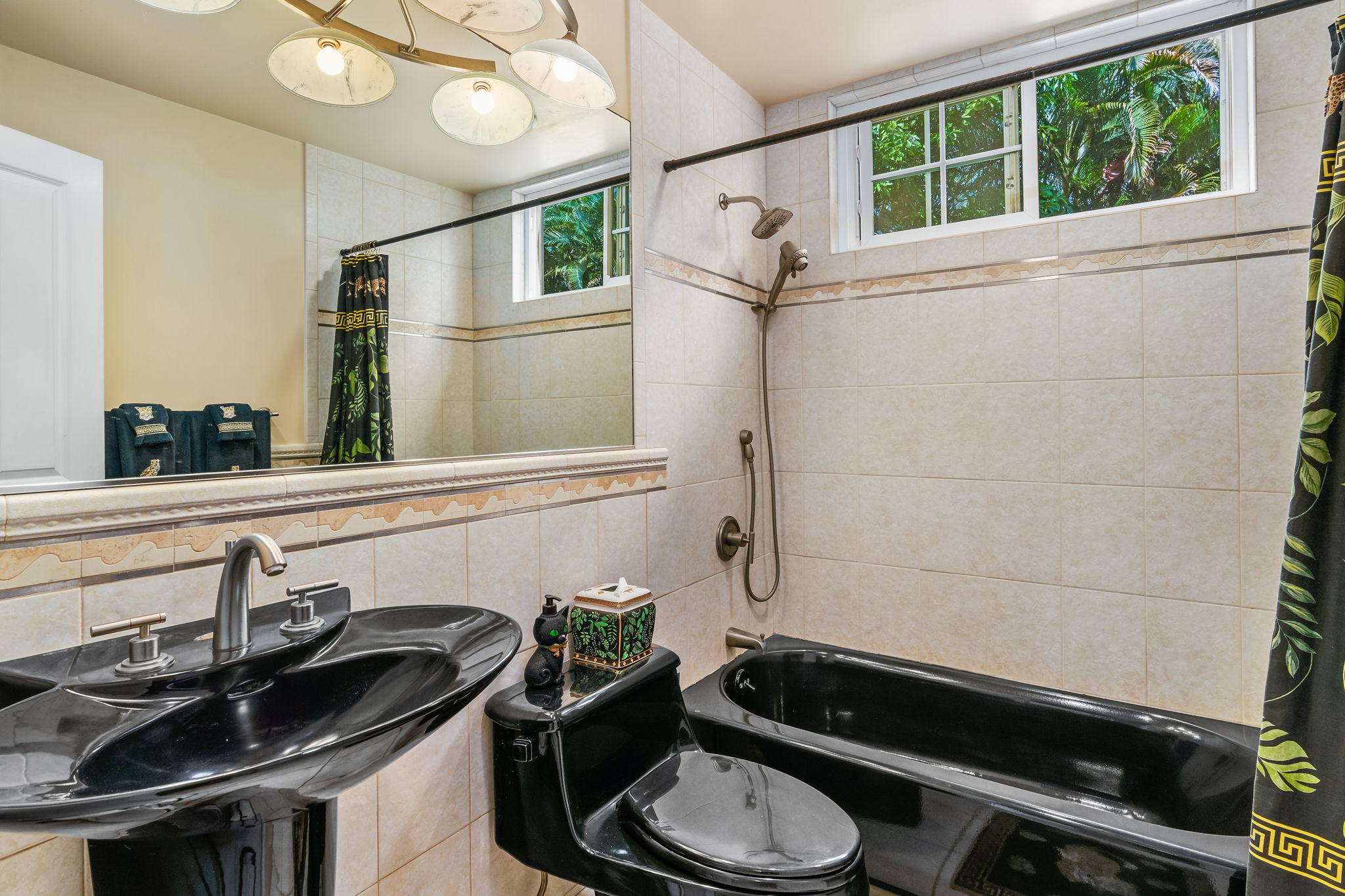 6201 B Kawaihau Road, Unit B Kapaa, HI 96746 - Photo 27 of 30 a bathroom with a sink a toilet and shower