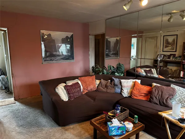 a living room with furniture and a couch
