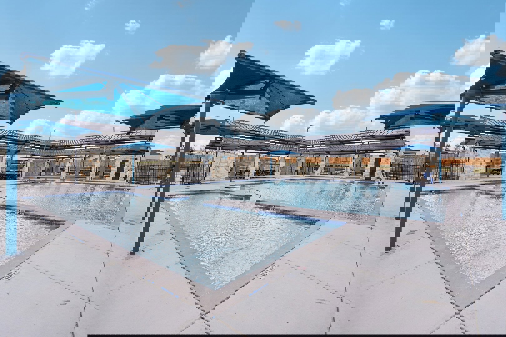 10612 Justify Lane Buda, TX 78610 - Photo 2 of 5 a view of a swimming pool with a patio