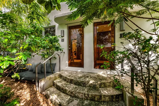a backyard of a house with lots of green space