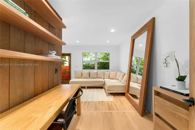 a open kitchen with stainless steel appliances granite countertop a lot of counter space and wooden floors