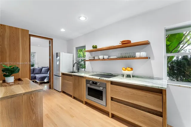 a living room with furniture and a area