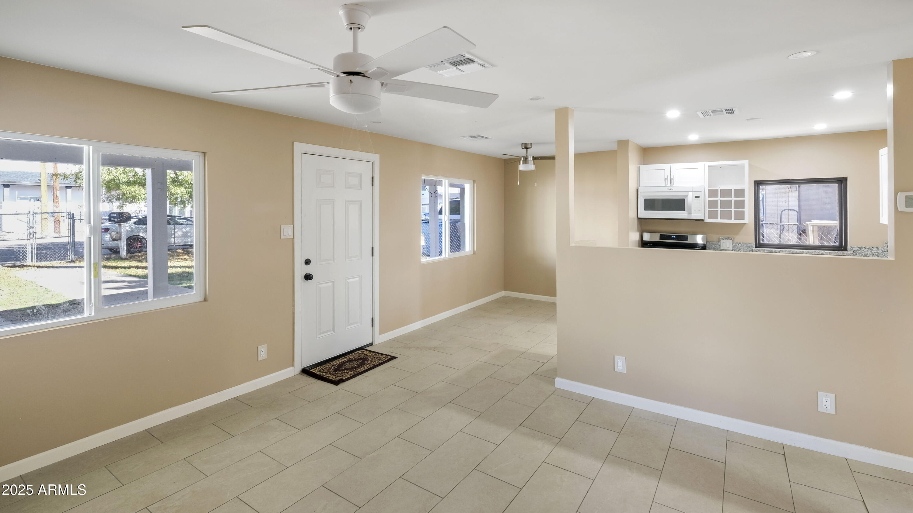 2333 West Coolidge Street Phoenix, AZ 85015 - Photo 5 of 9 a view of a kitchen with a sink and cabinet area