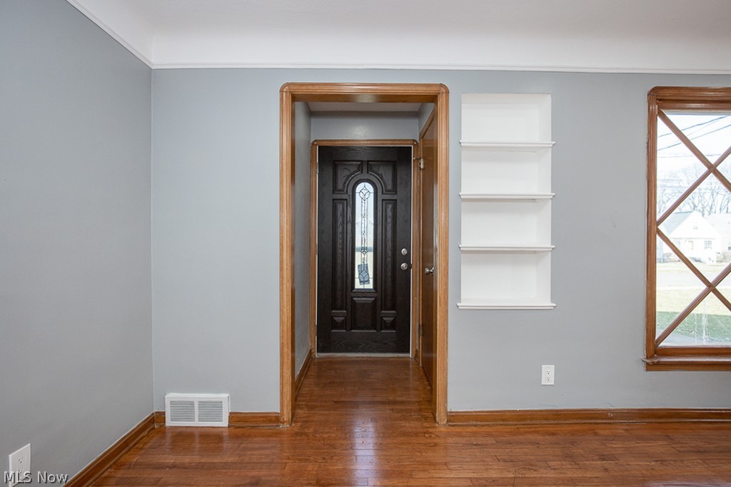 2231 Lorimer Road Cleveland, OH 44134 - Photo 4 of 28 Foyer with dark hardwood / wood-style flooring
