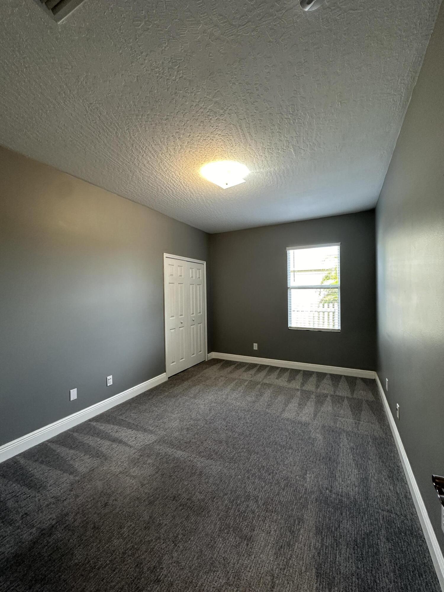 4010 Caparosa Circle Melbourne, FL 32940 - Photo 15 of 20 a view of an empty room and a window