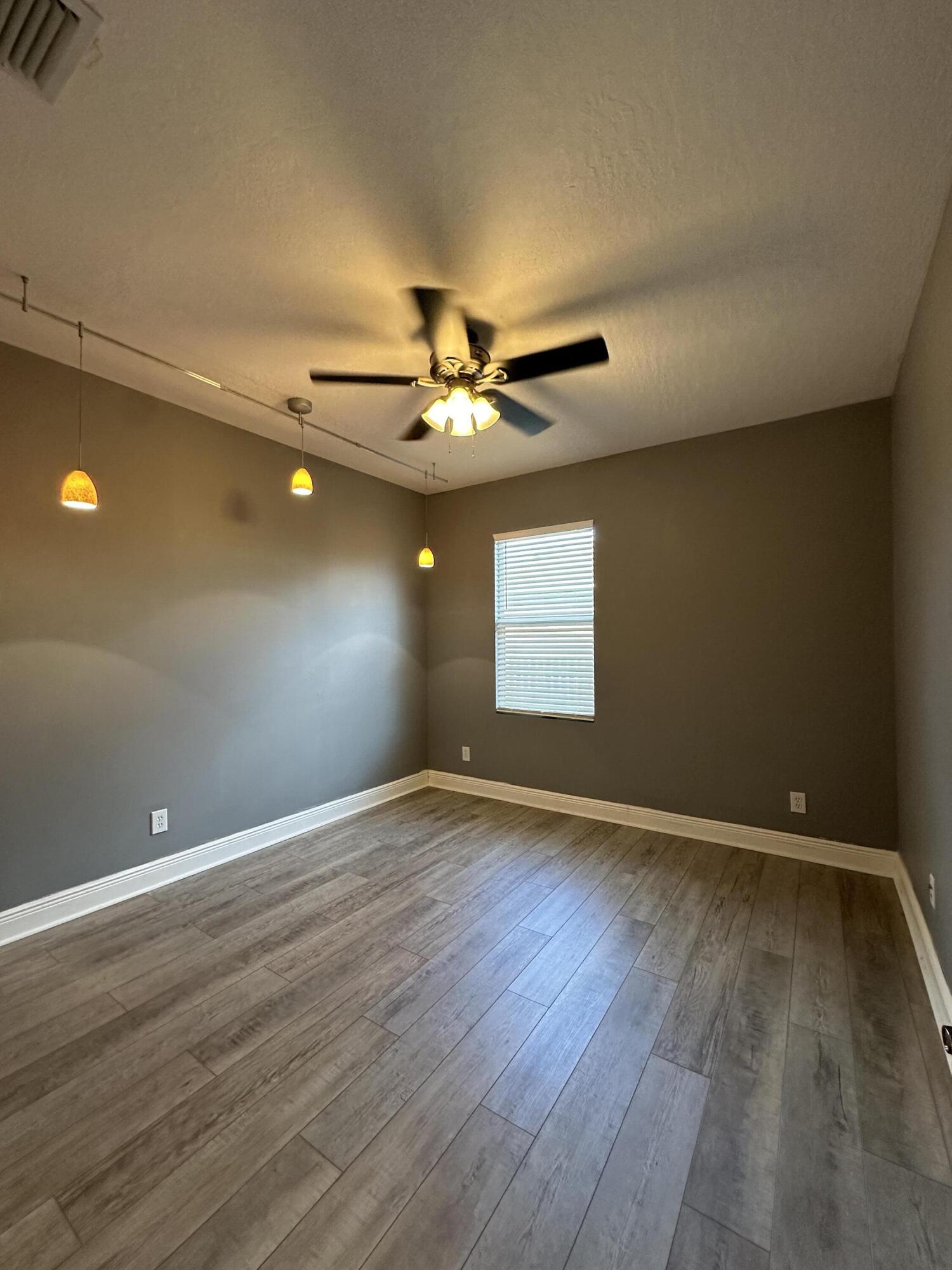 4010 Caparosa Circle Melbourne, FL 32940 - Photo 16 of 20 a view of an empty room with a window