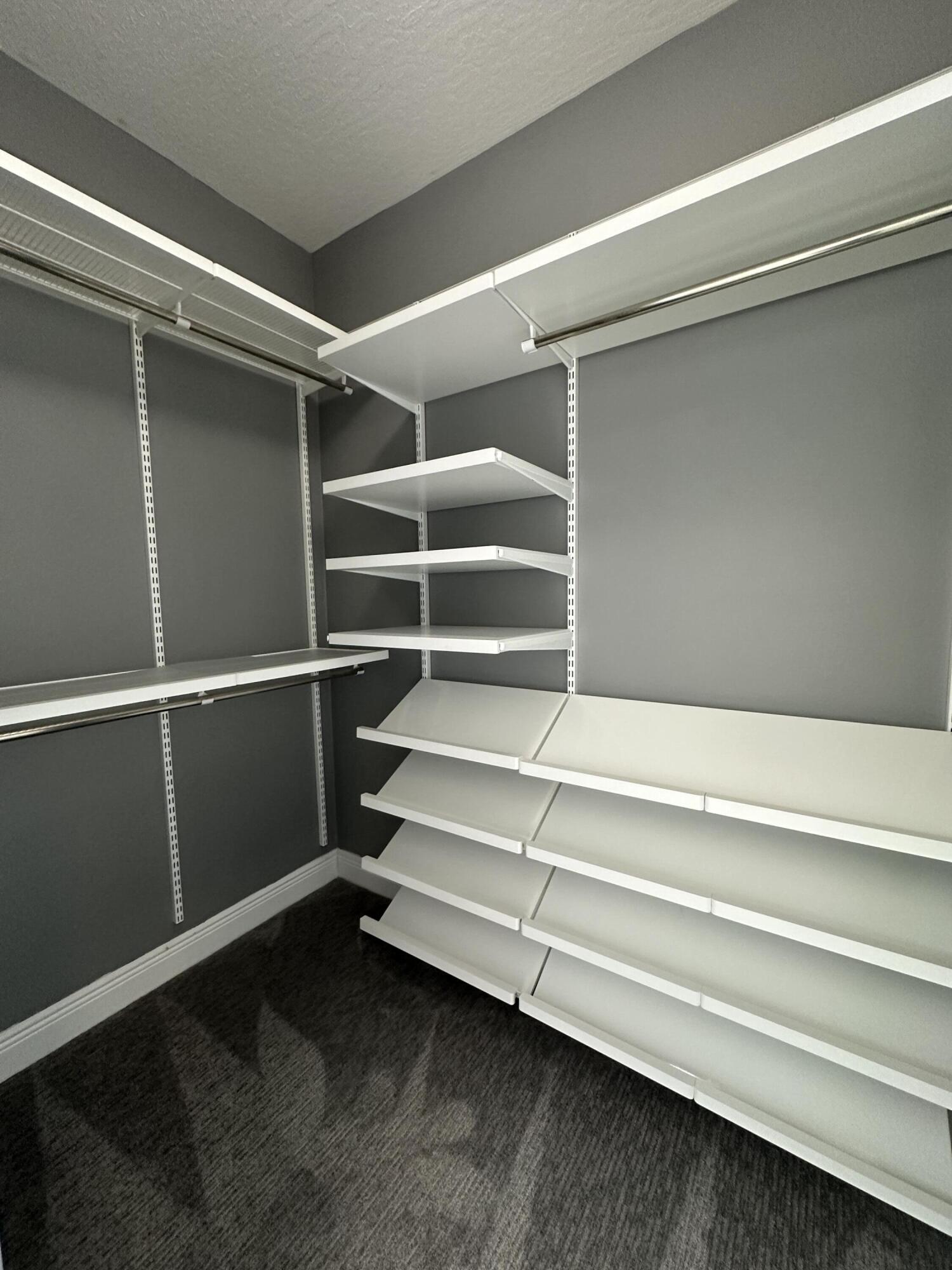 4010 Caparosa Circle Melbourne, FL 32940 - Photo 10 of 20 a view of walk in closet with empty racks