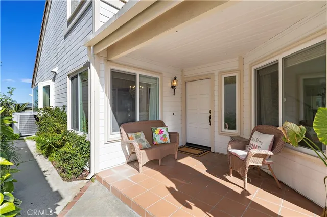 a outdoor living space with furniture and a potted plant
