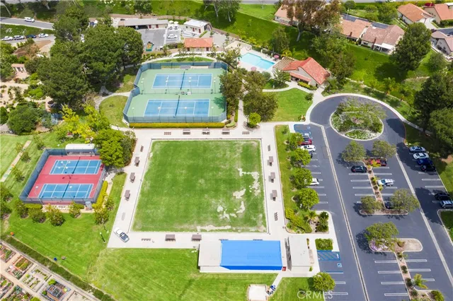 an aerial view of a house with a lake view