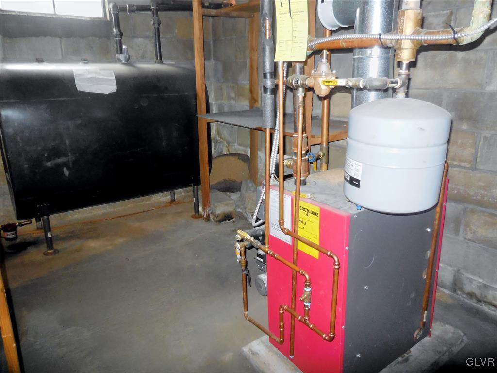 6425 Jacksonville Road Bath, PA 18014 - Photo 34 of 42 utility room in basement, new oil tank and hot wat