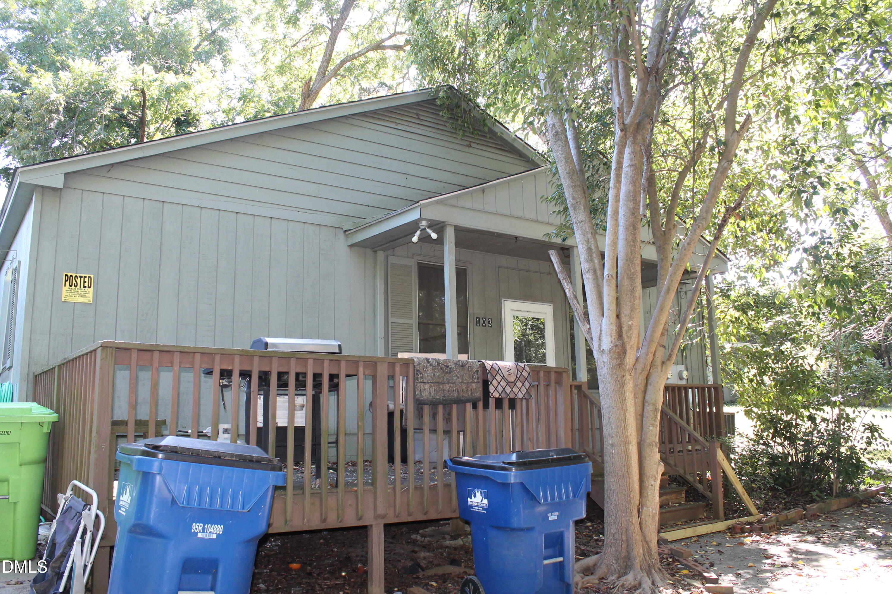 103 Gary Street Raleigh, NC 27606 - Photo 3 of 6 a view of a house with backyard and sitting area