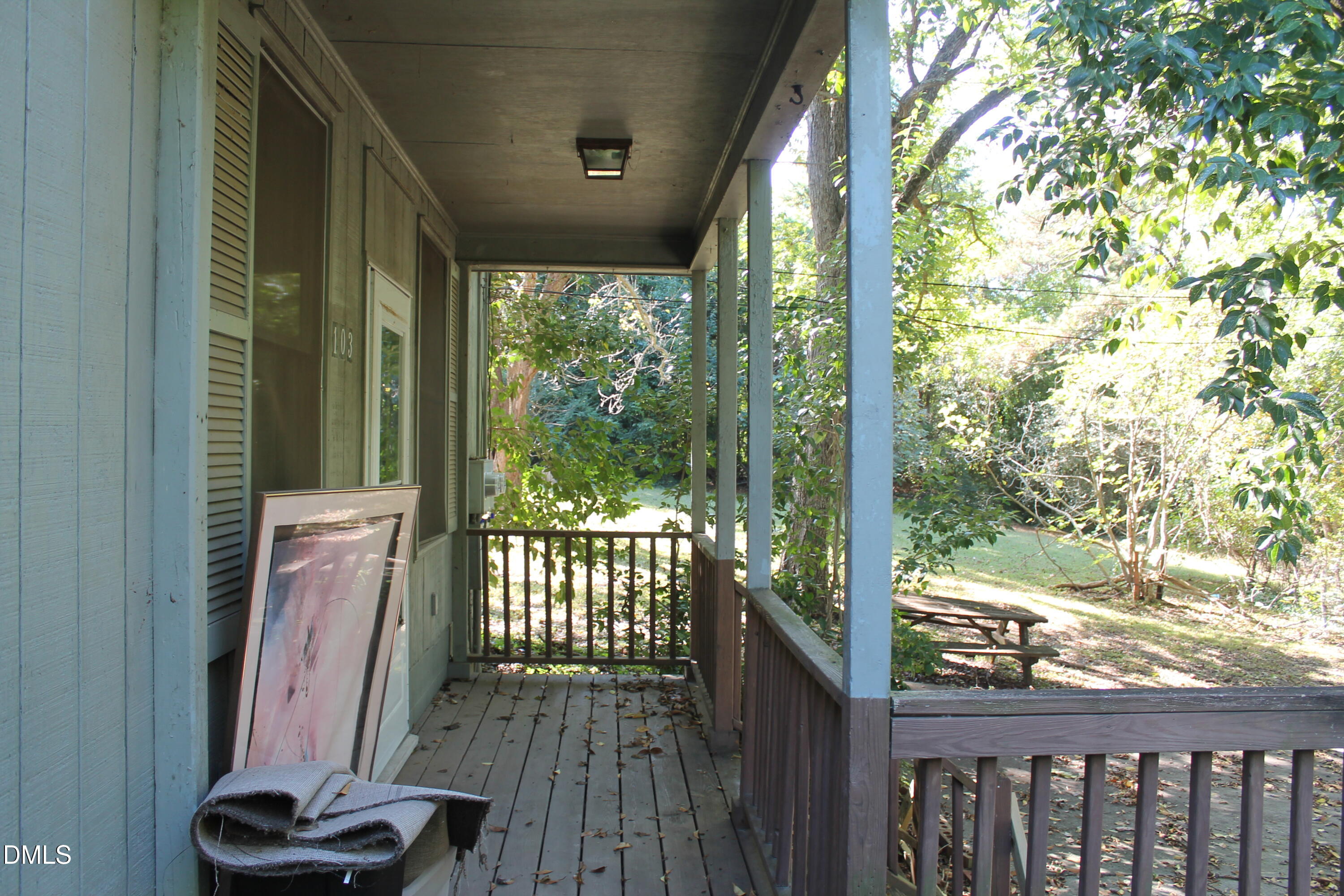 103 Gary Street Raleigh, NC 27606 - Photo 6 of 6 a view of a balcony with wooden floor