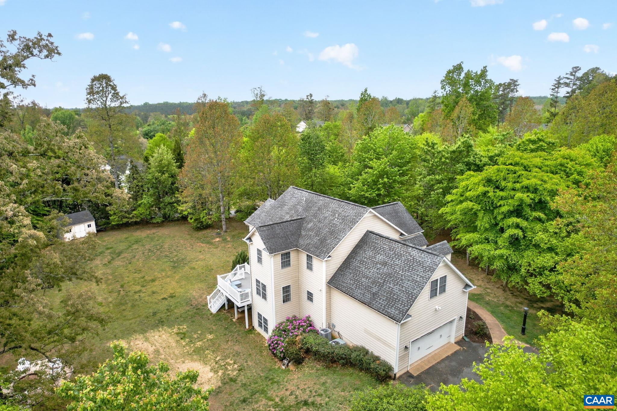 511 Taylor Ridge Way Palmyra, VA 22963 - Photo 52 of 57 a view of a house with a yard