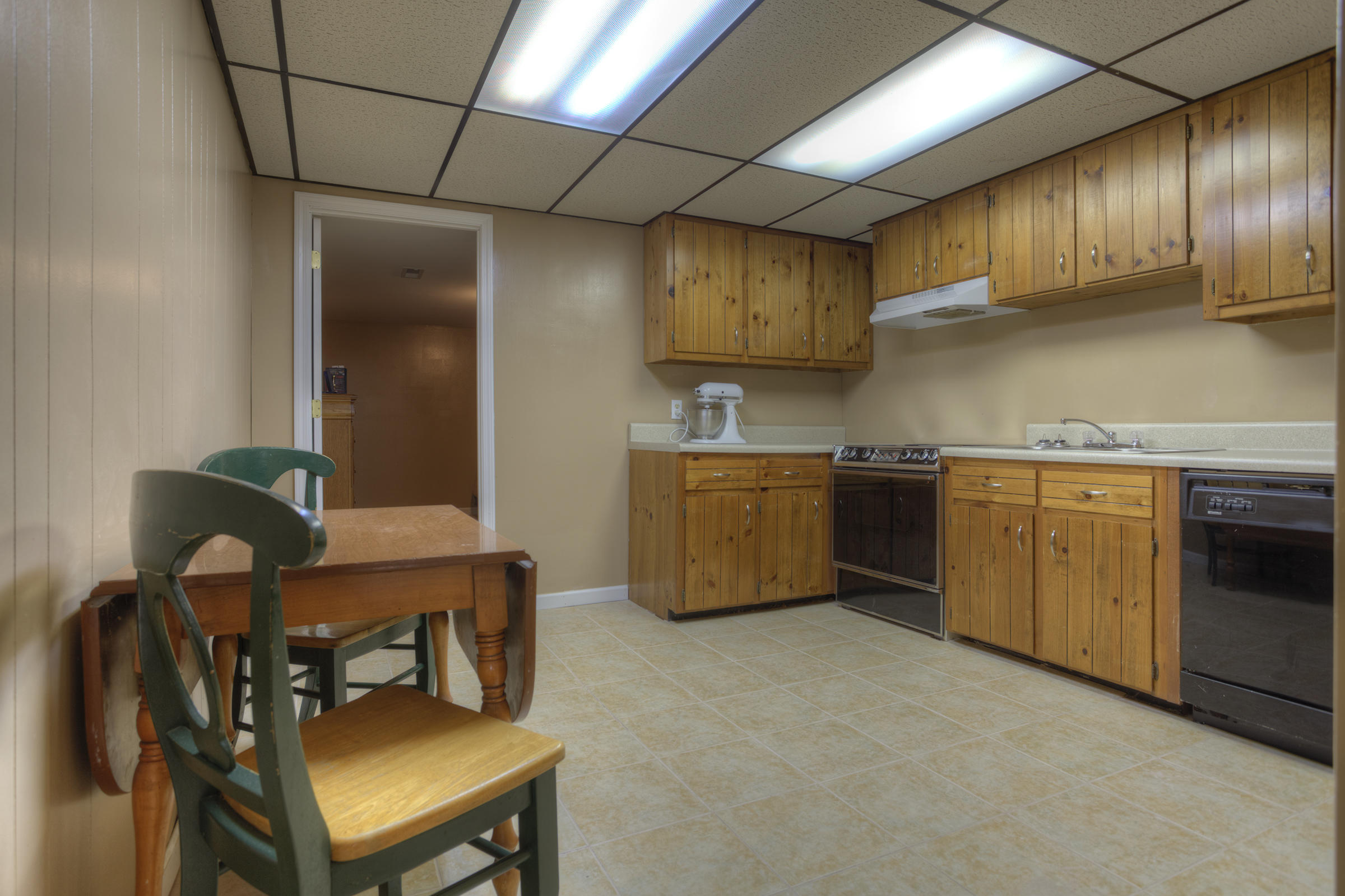8225 Spruceland Road Powell, TN 37849 - Photo 26 of 40 024_Basement Kitchen