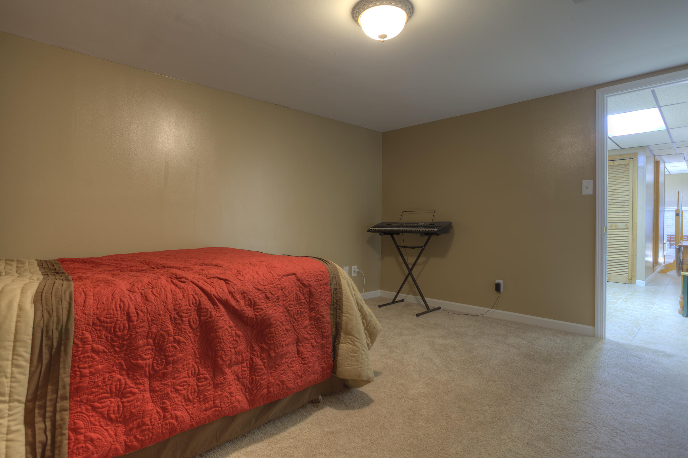 8225 Spruceland Road Powell, TN 37849 - Photo 33 of 40 031_Basement Bedroom Four