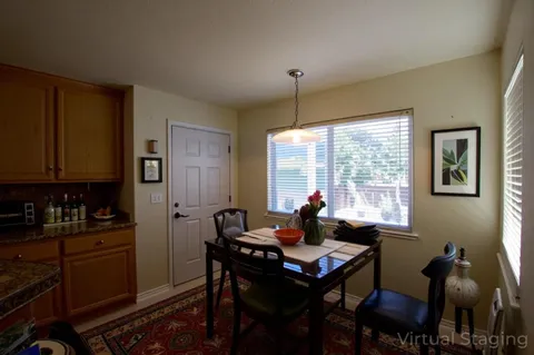a living room with furniture and window