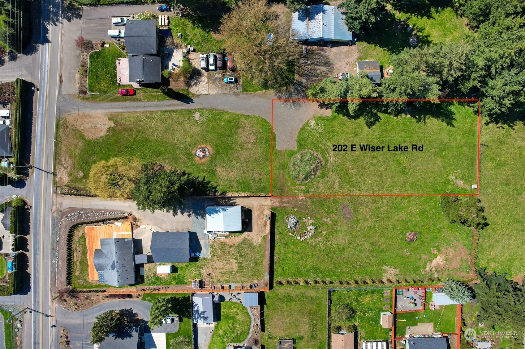 202 East Wiser Lake Road Lynden, WA 98264 - Photo 11 of 12 an aerial view of residential houses with outdoor space and street view