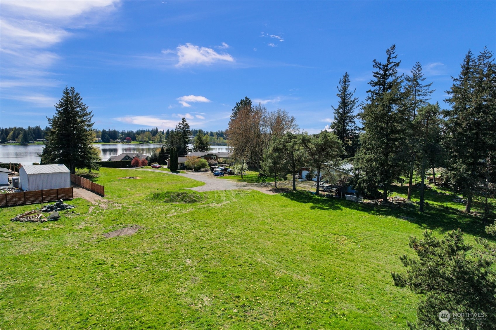 202 East Wiser Lake Road Lynden, WA 98264 - Photo 5 of 12 a view of a garden with a house