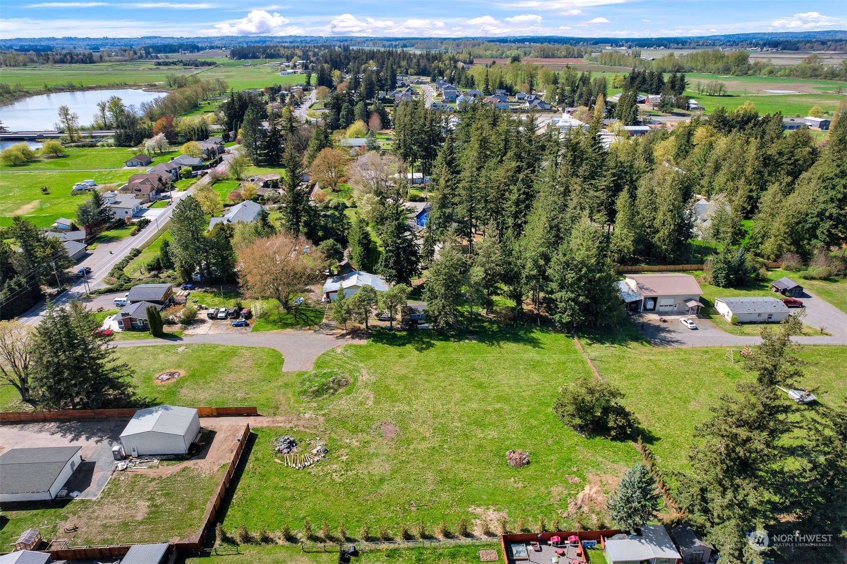 202 East Wiser Lake Road Lynden, WA 98264 - Photo 10 of 12 a view of a garden with houses